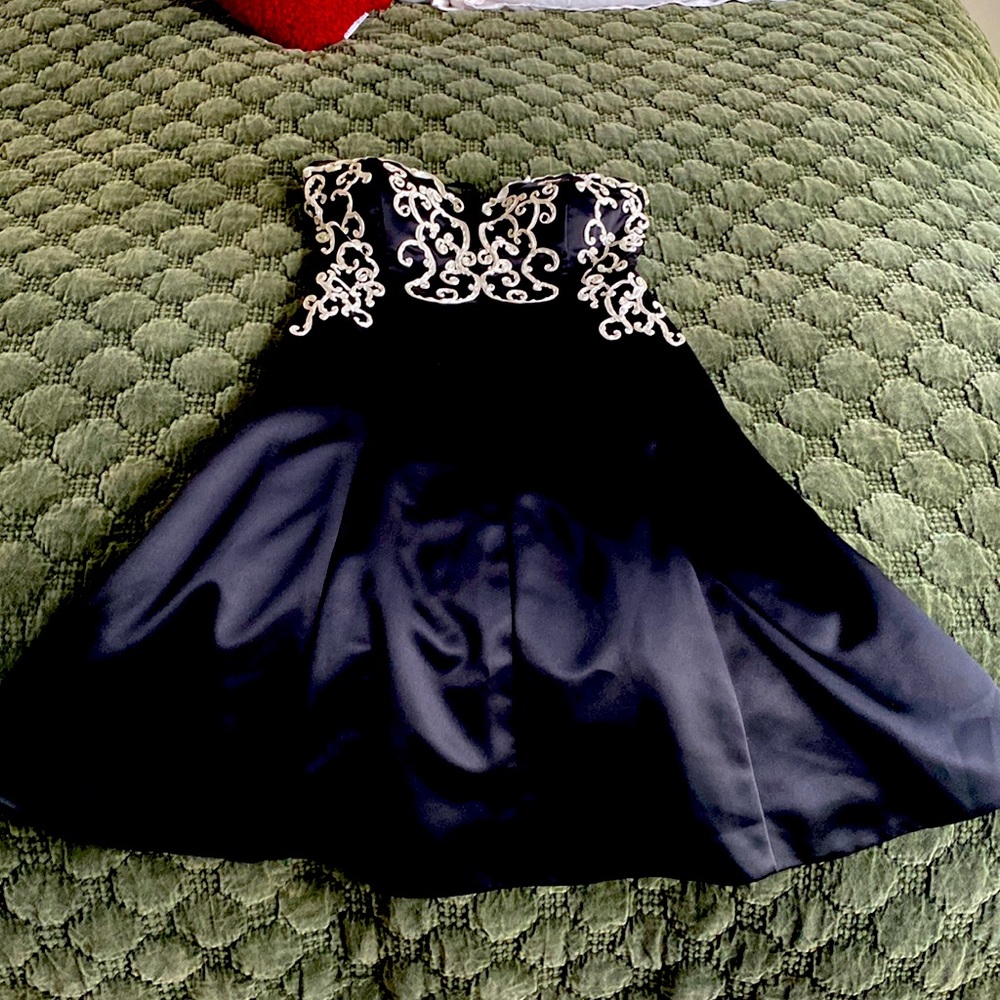 Women’s strapless black cocktail dress